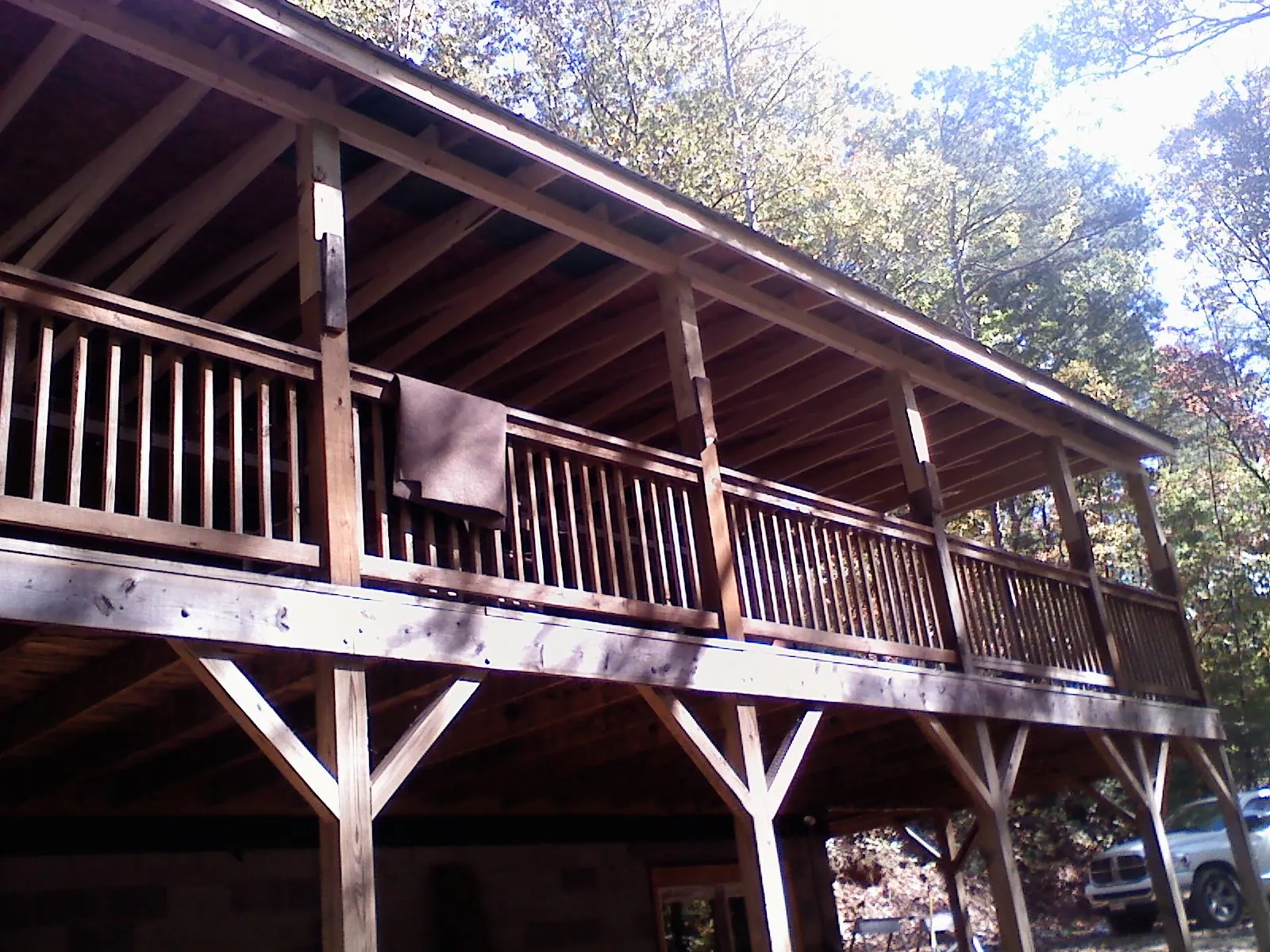 Timber framing under a new elevated porch and deck — Roof Leak Repair in Mastic by Roofing Brothers